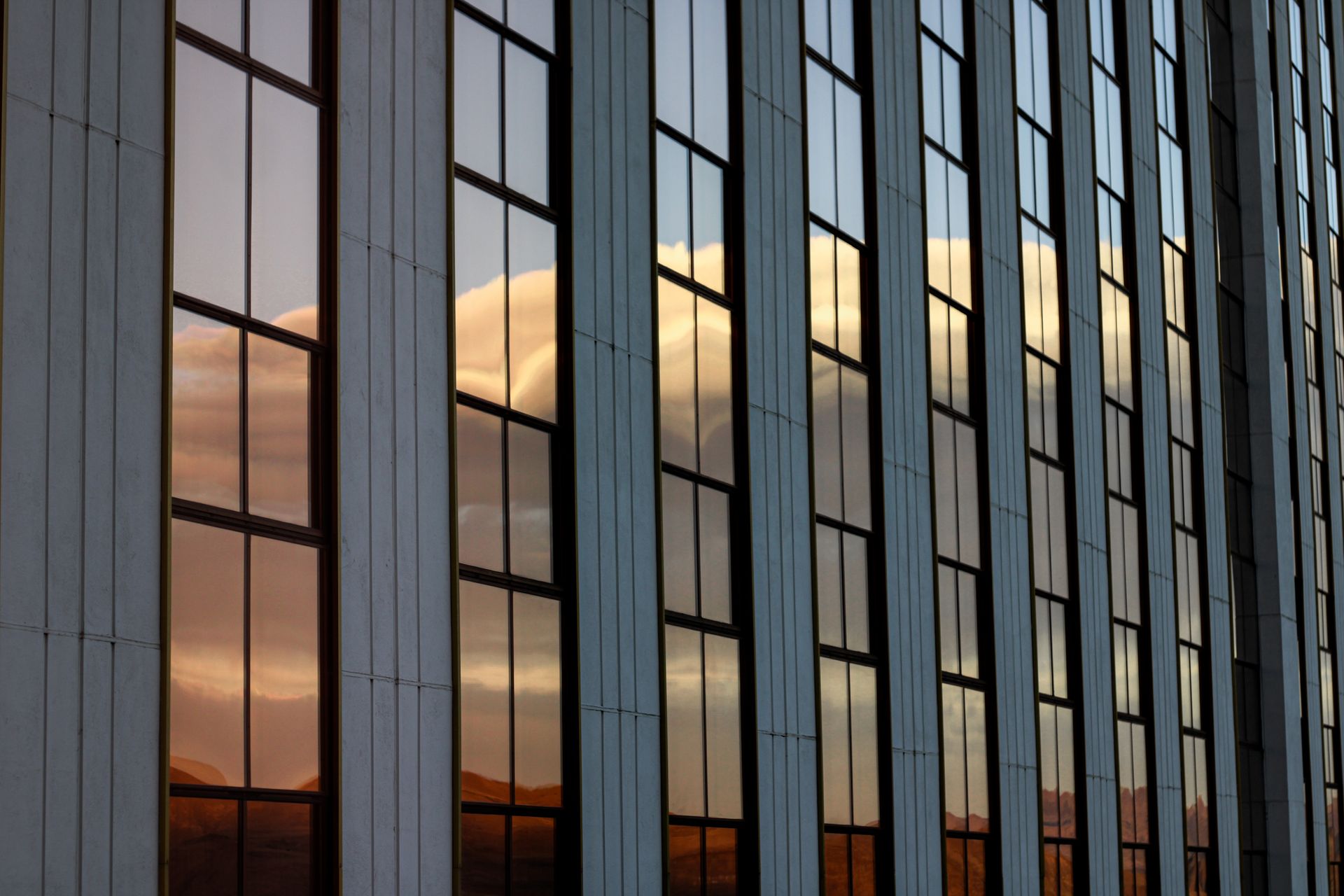 Glass building facade in Reno, Nevada at sunset