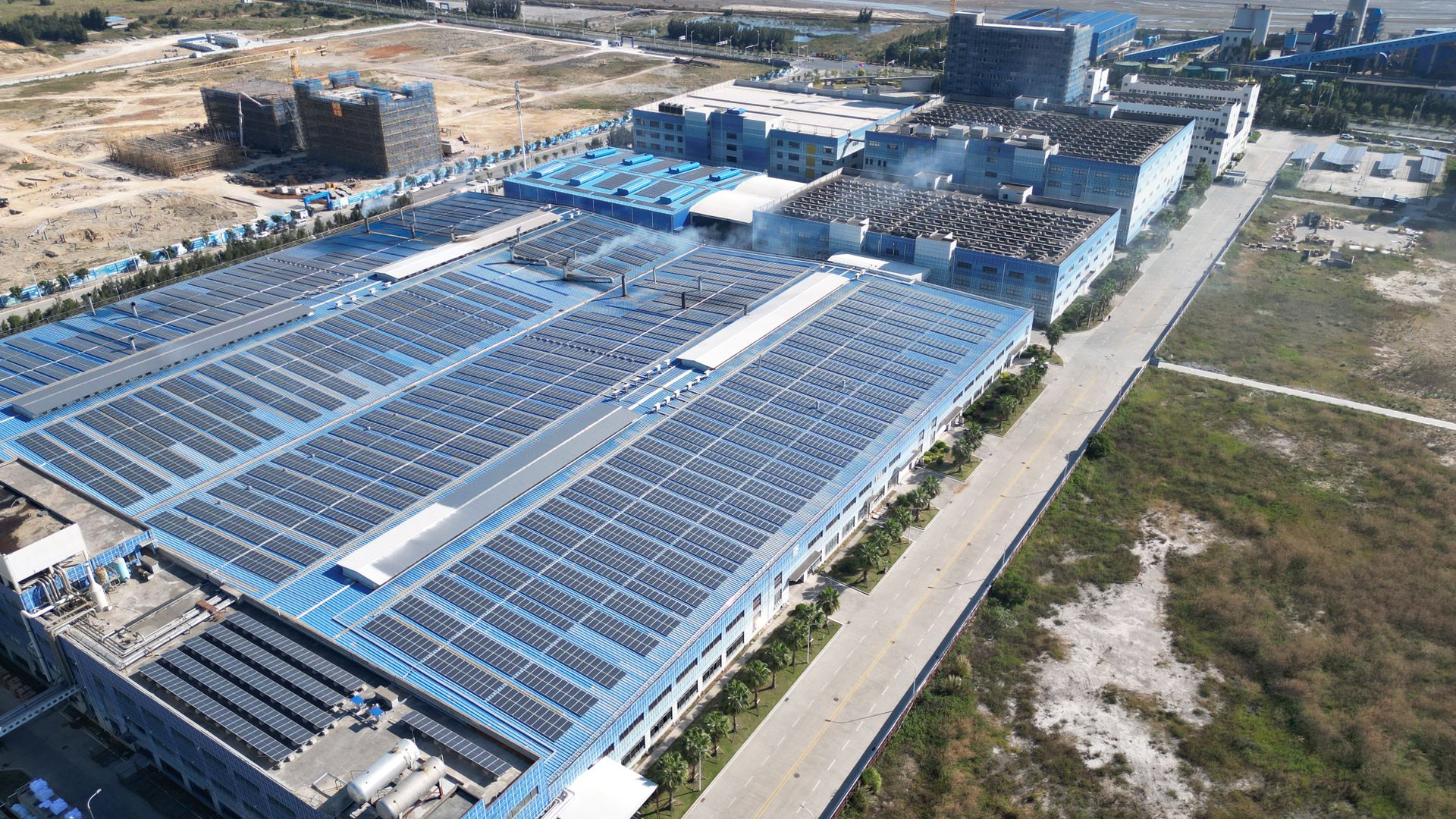 Solar panels installed on a large commercial roof